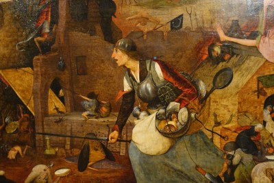 Mayer van den Bergh Museum: detail of Dulle Griet (Mad Meg) by Pieter (I) Bruegel (1563). Griet is a figure of the Flemish folklore (Ghent), a peasant woman who led an army of women in order to loot Hell. She is seen here advancing towards the mouth of Hell, wearing an armour and already carrying some loot.