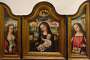 Triptych showing from left to right Catherine of Alexandria, Mary with Child and Barbara by the Master of the Magdalene Legend (1500). Click here for a full view of the triptych.