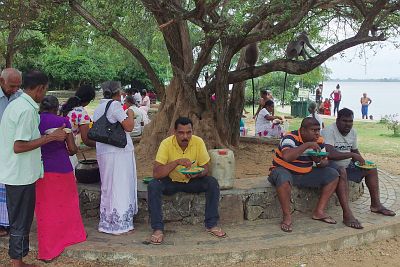 Sri Lankan tourists having a picnic in Polonnaruwa.