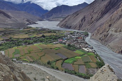 Day 26: view down the Kali Gandaki valley over the village of Kagbeni. Note the little dots on the sand in the river bed right of the village: they are people searching for shaligrams.