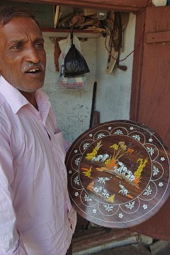 This man in Mysore had a little workshop where he showed us how he was making marquetry objects and furniture