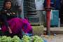 Imphal (Manipur): woman selling grapes in the pedestrianised Thangal Road which leads to the Ima Keithel Market.