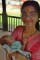 Hajo (Assam): young mother with her newborn at a temple.
