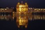 India, Gujarat: the Golden Temple in Amritsar by night.
