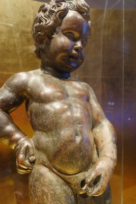 The original statue of the emblematic Manneken Pis is kept in Brussel's City Museum (photo). The statue displayed in the street is a copy.