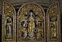 Triptych with the Virgin framed by Saint Dominic on the left and Saint Bernard on the right.