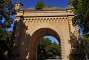 The Porte Serpenoise. It was built in 1852, not far from where a former city gate once stood. It was originally a 30-metre-long curved tunnel passing through the embankment of the southern rampart of the citadel. In 1902-1903, when the ramparts were dismantled, the gate was redesigned and took on its current form as a triumphal arch. Only a section of the gate was preserved, and four turrets and a staircase were added.
