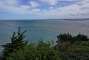 View towards the bay of Saint-Brieuc from the Pointe du Roselier. There are huge mussel banks in the bay which are accessible at low tide. Look for the large and long black area in the water on the top right before the coastline to find them.