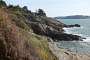 On the way to Port Manec'h with its lighthouse looming behind the rocks.