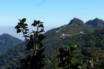 Many ridges leading to several peaks depart from the summit plateau, all dotted with shrines along the way and a temple on their highest point.