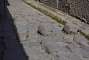 A nice feature in Pompeii's streets: stepping stones set across the road allowing pedestrians to cross without getting wet feet or without having to step down and up again. The town has been built on a slope and when heavy rain fell, it used to flow through the streets, making it difficult to cross them.