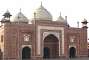 The Taj Mosque on the west side of the complex. It is mirrored on the east side by an identical building which has no other purpose than symmetry and harmony (it cannot be used as a mosque as its Mihrab would not be facing towards Mecca; some suppose it might have been used as a guesthouse).