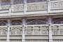Detail of the intricately carved balconies of a house on the streets of Mumbai.