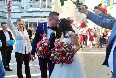 A happy couple leaving the church of Dumitru in Suceava.