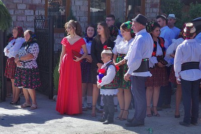 Wedding party in the village of Năneşti. The lady in red was a bridesmaid.