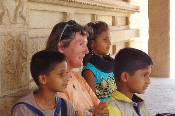 Resting in Hampi: Thomas took this picture as the mother of the three kids was herself making a snapshot of us four