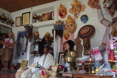 The island of Majuli (in the Brahmaputra and the biggest riverine island in the world) is famous for its mask production. Hindu temples all over Assam sport masks created here. If you look closely you can see the five stages of mask production in the foreground to the left..
