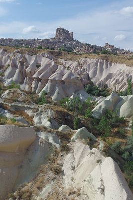 View of Uçhisar and its rock-castle as seen from the top of Zemi valley.