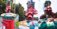 Basingstoke, Hampshire: an Elizabeth II pillar box decorated by one of the many UK post box topper knitters.