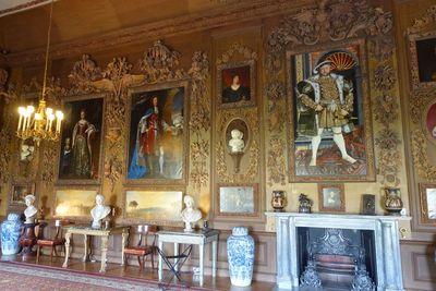 View of the Carved Room with portraits of the 6th Duke and Duchess of Somerset next to Henry VIII