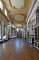 Perspective of the long library with the monumental pipe organ at its end and rows of books along the side walls. Originally created as a picture gallery it was converted to a library by the 9th Duke; it contains over 10,000 volumes. Click here for a 360° view of the long library.