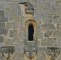 The coat of arms displayed on the gatehouse. The middle one features the arms of Dalyngrygge and is framed on the left by the one of Wardieu for his wife Elizabeth and on the right by the one of Radynden for his mother Alice. Above the slit window, spot a helmet with a unicorn. The unicorn was Sir Edward's crest, and he wore a helmet like this when he went into battle.