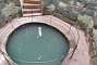 In the south-west tower: this pool was probably fed by a spring and used as a well.