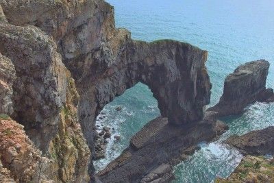 The Green Bridge of Wales on the South Pembrokeshire Coast Path, near Stack Rocks in the Castle Martin firing range.