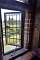 A room with a view, note the ornate window frame.