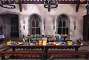 Dressing the table in the miniature Tudor house.