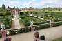 The Elizabethan gardens created by Robert Dudley to please Elizabeth I and recreated from documents of the time by English Heritage. The pavilion at the back is an aviary and there is a Carrara marble fountain in the middle.