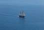 Sailing ship on a calm sea.