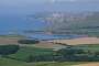 Kimmeridge Bay and Clavell Tower seen from top of the ridge.