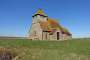 St Thomas Becket in Fairfield. The church sits alone next to a water-filled dyke and is visible from a great distance across fields and grassland. Until the 1960s it was often cut off by winter flooding when it could only be reached by boat.