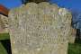 St Eanswith in Brenzett. A tombstone in the churchyard.