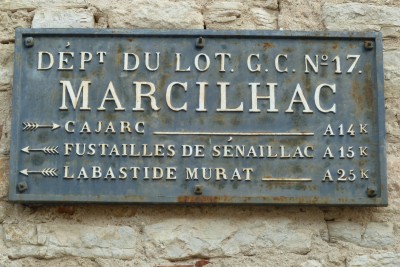 Old road sign in rural France.