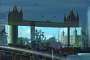 England, London: Tower Bridge and Tower playing games (reflection from a restaurant window on the South Bank).