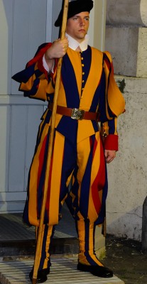 A colourful guard in front of the Vatican Museum.